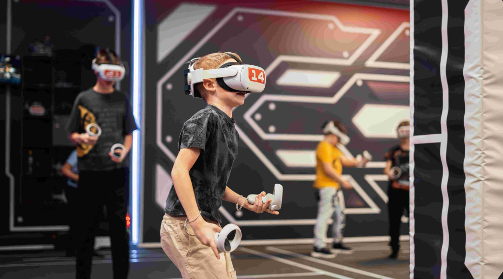 a boy playing VR game